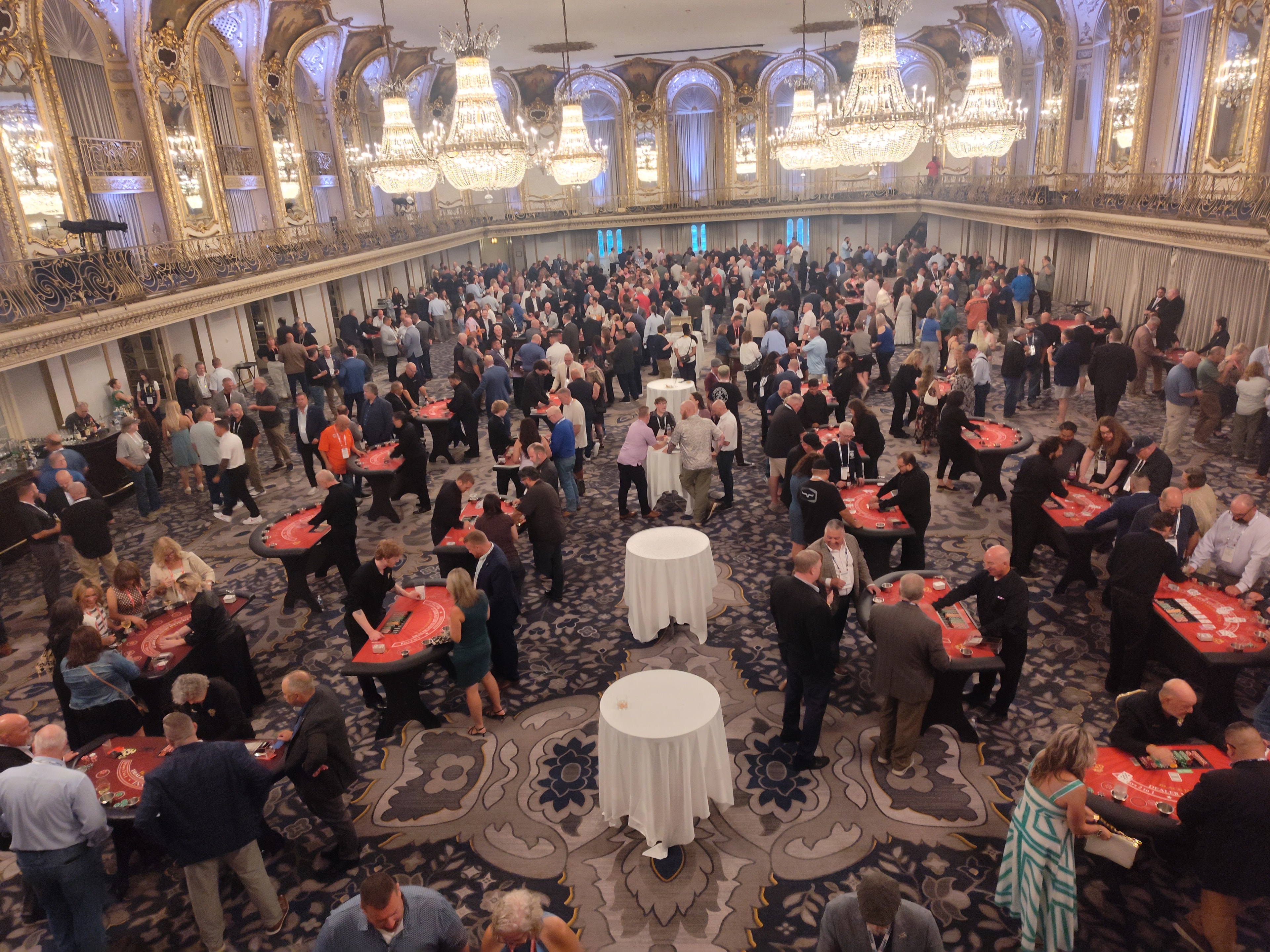 Full view of the 60-table casino party filling the Hilton Chicago Grand Ballroom