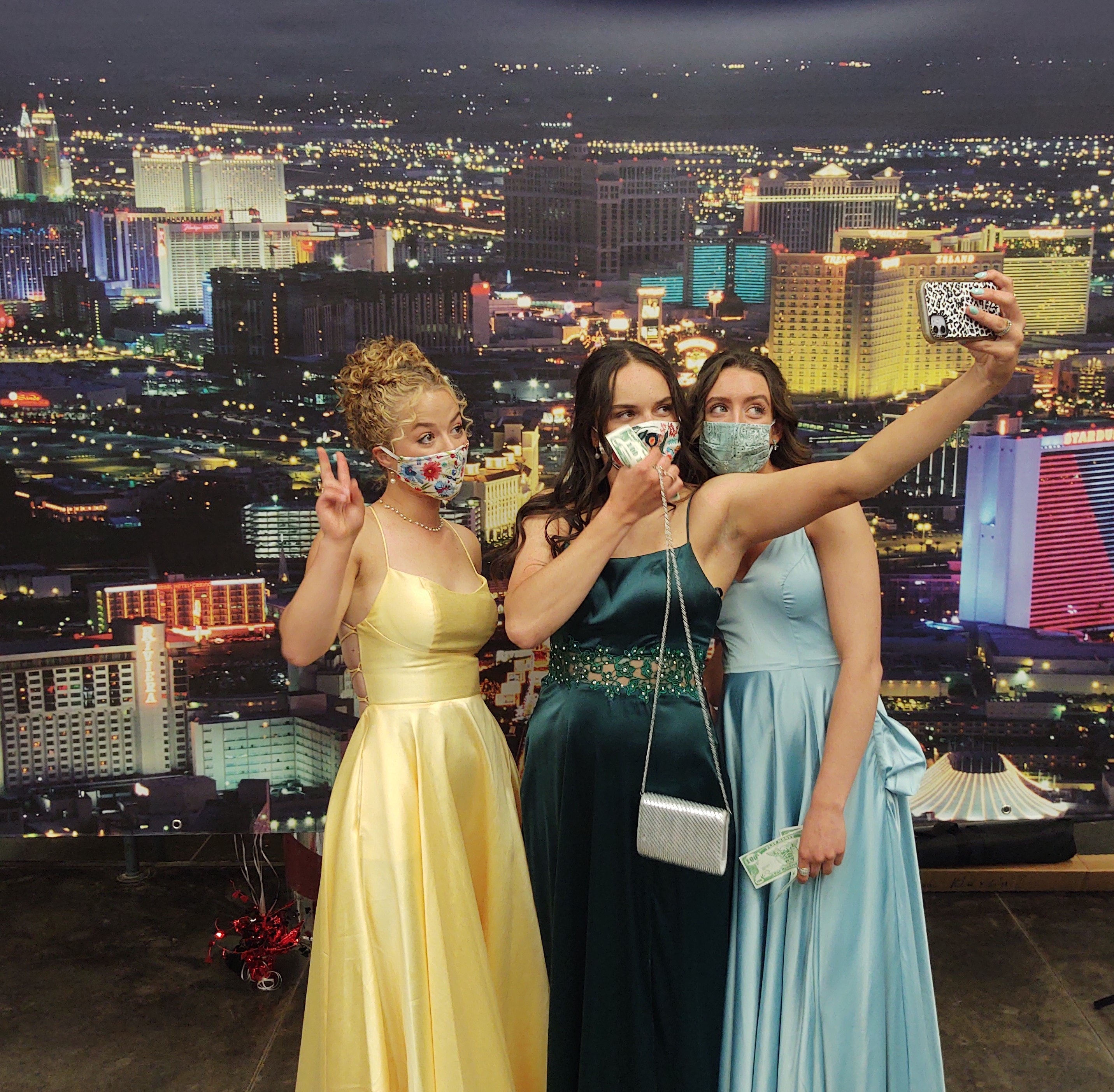 Guests enjoying the Casino Party USA selfie station at a corporate event