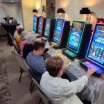 Players at arcade gaming machines